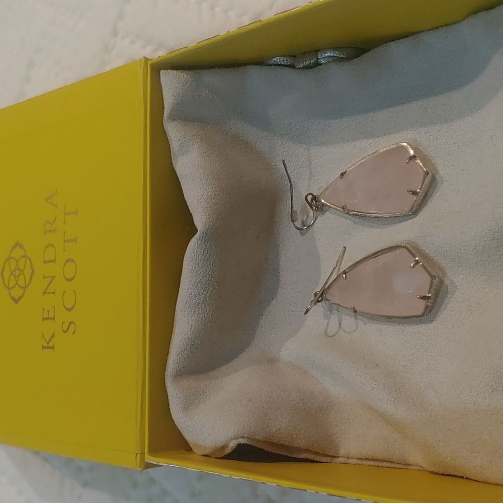 Kendra Scott gold drop earrings with pink stones